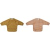 2 Afwasbare mouwslabben - Merle cape bib print 2-pack check/graphic stroke golden caramel mix (Geboortelijst Cézar C.)